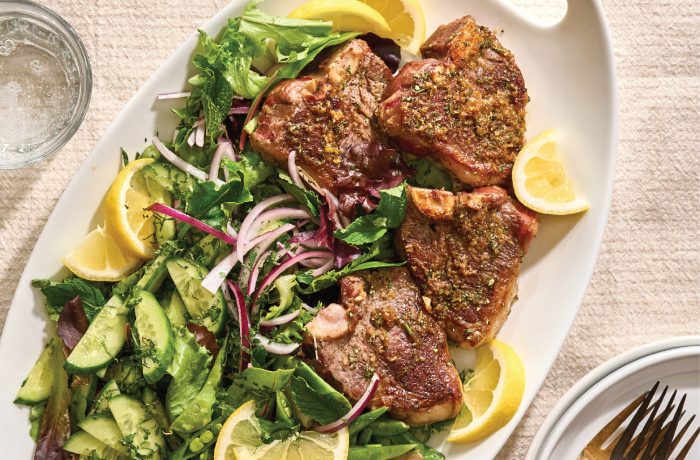 Lamb loin chops served with lemony mint salad and fresh greens.