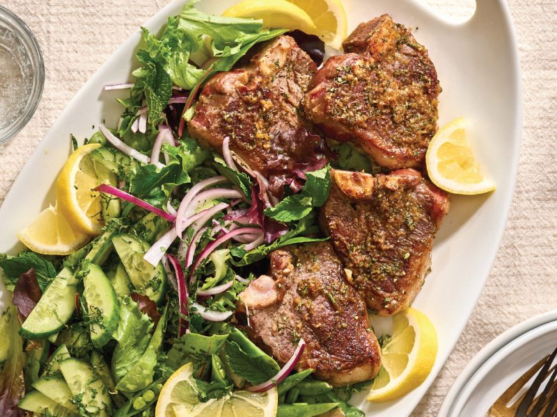 Lamb loin chops served with lemony mint salad and fresh greens.