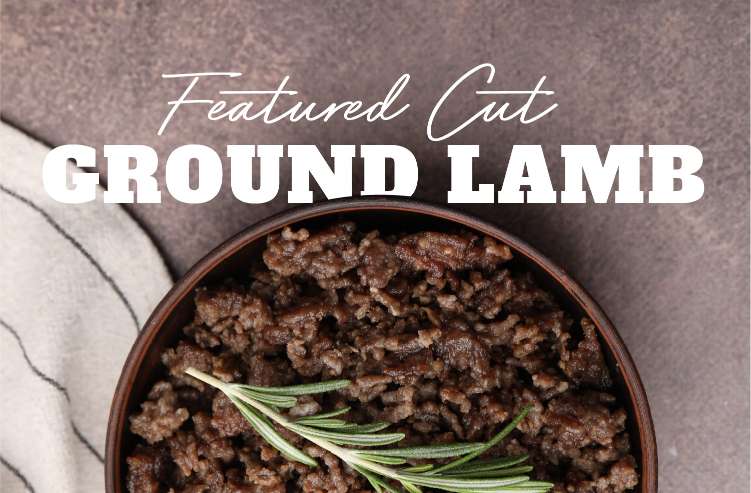 ground lamb cooked in a bowl with a sprig of rosemary on top