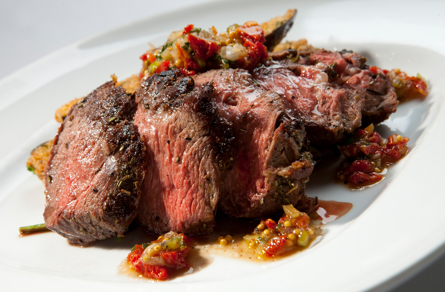 Rosemary-Roasted Leg of Lamb with Sundried Tomato and Mint Relish